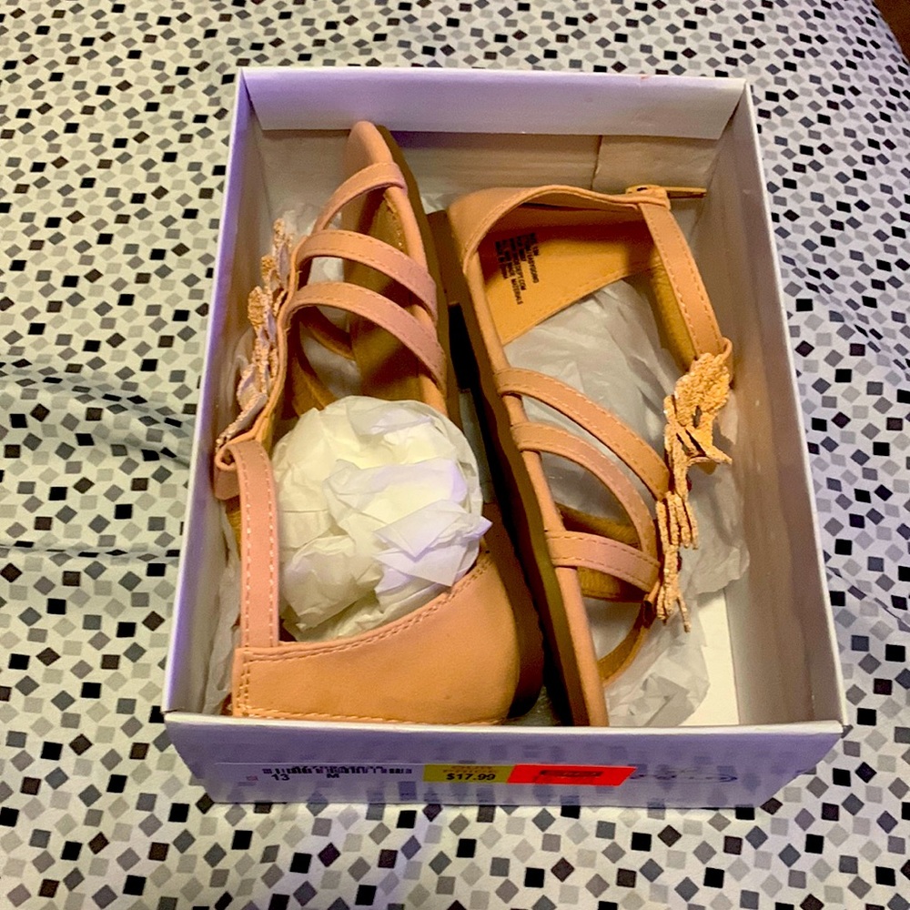 A pair of little girl shoes